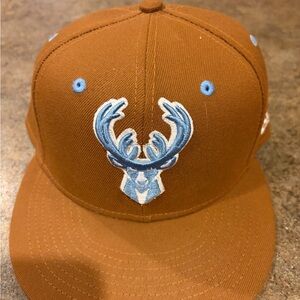 New Era Brown and Blue Milwaukee Bucks Cap